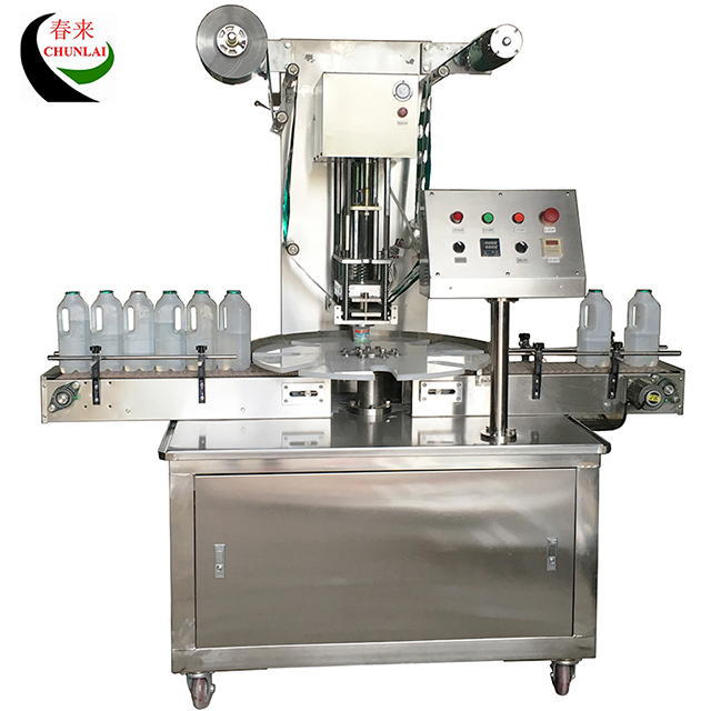 Machine d'étanchéité de bouteille de lait en rotation KIS-1800